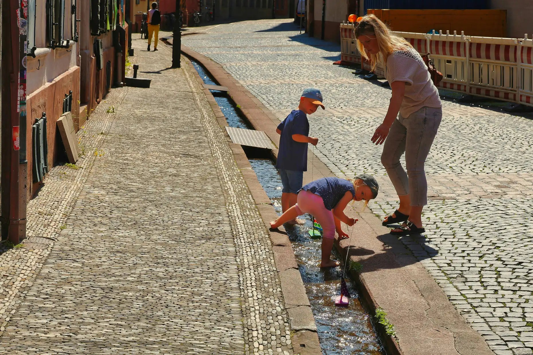 These 5 Simple Puddle Games That Encourage Balance, Curiosity, and Early Learning